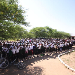 The primary school pupils gather on the playground